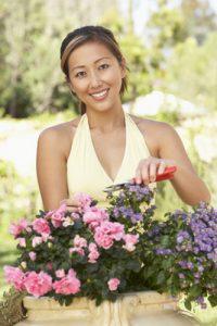 Woman Planting Flowers